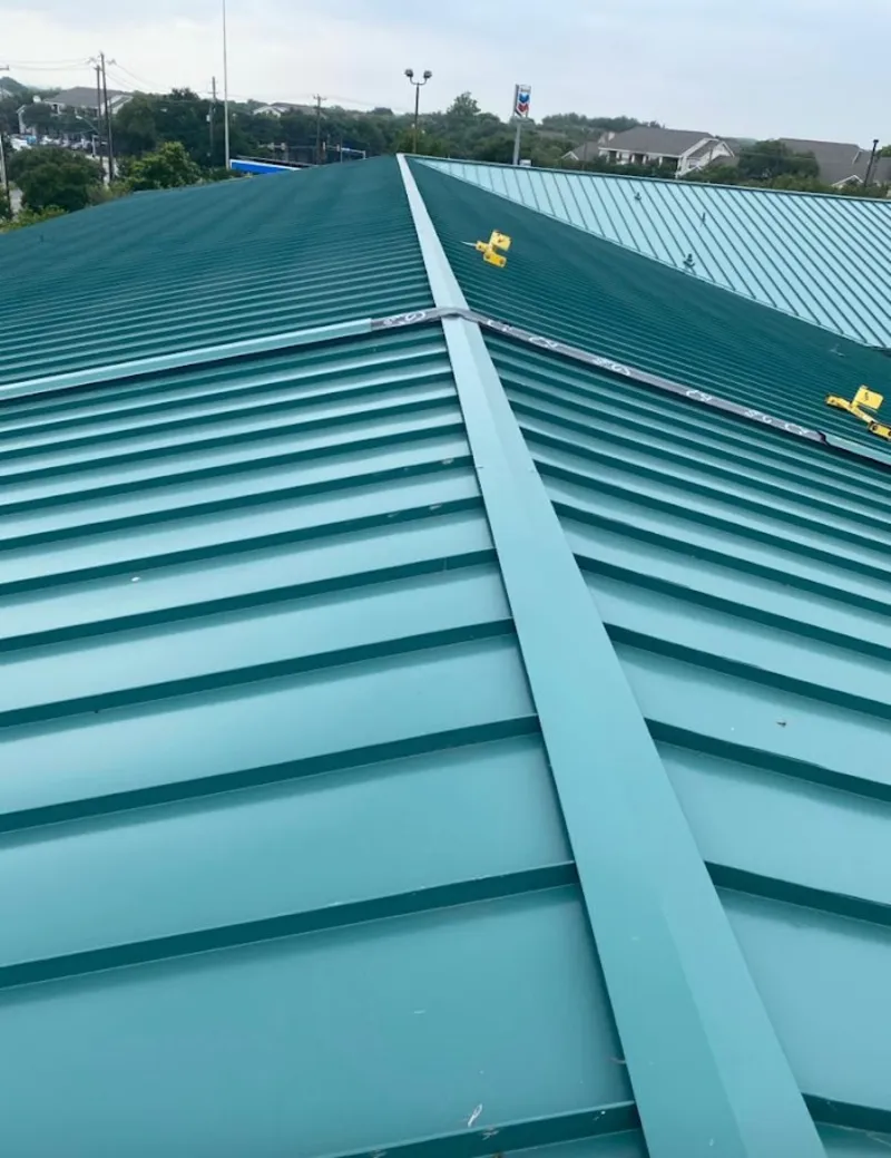 Green commercial metal roof ridge and valley for Metal Roof Repair in Jasper