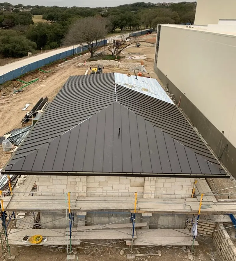 Metal roof new construction with scaffolding in Jasper