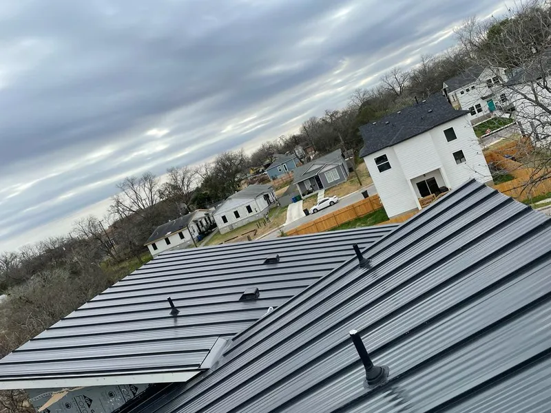 Standing seam metal roof panels with vents for Skylight Repair in Jasper